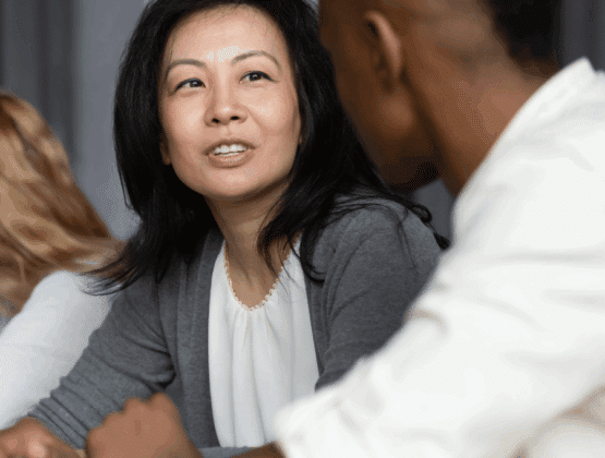 Two colleagues in a conversation