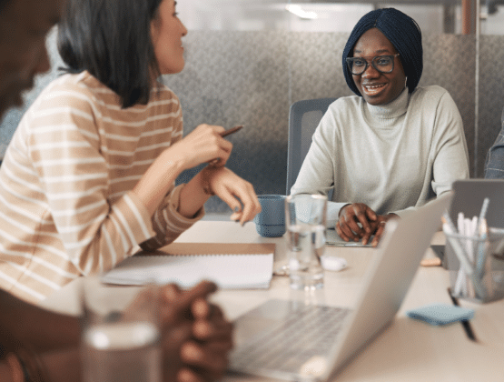 Colleagues talking in a meeting