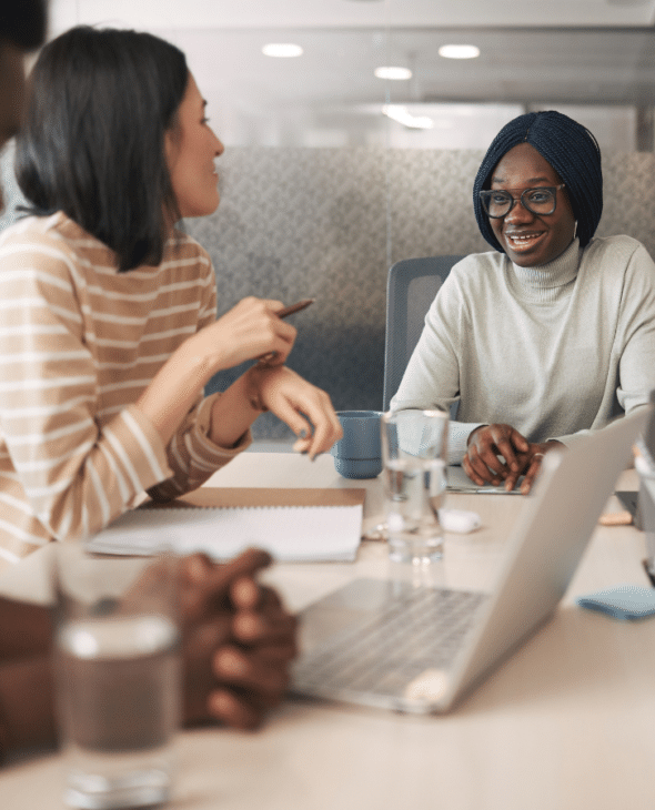 Colleagues talking in a meeting