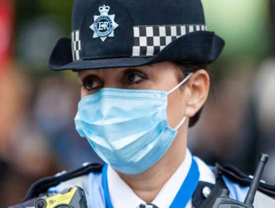 Police officer with a mask on