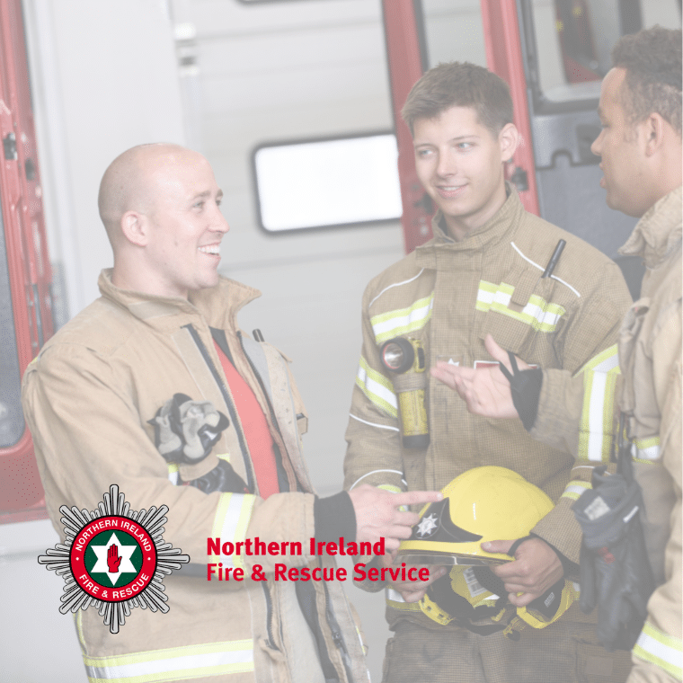 Northern Ireland Fire and Rescue Service logo overlayed on an image of three firefighters.