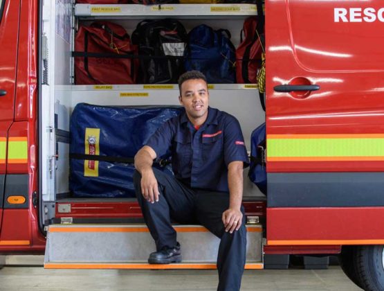 Fire fighter sat in van