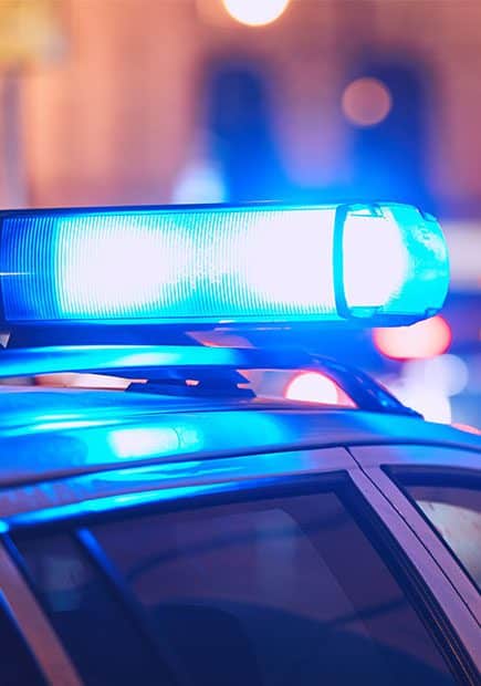 Police car with blue lights on