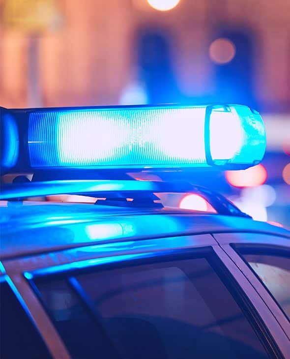 Police car with blue lights on