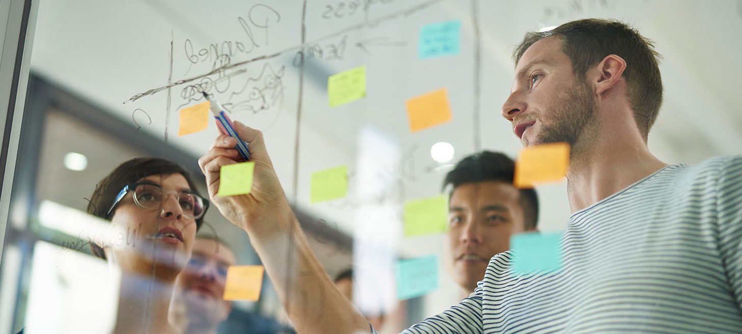 Group of colleagues working together in workforce planning