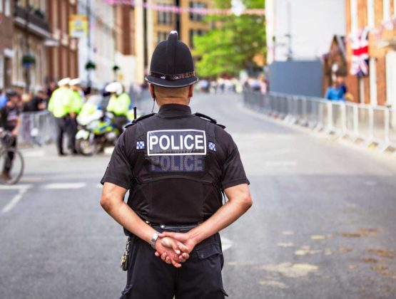 Back of police officer in street