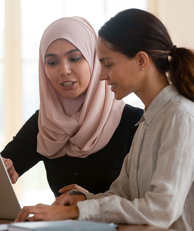 Trainer working with apprentice
