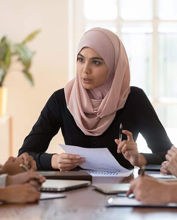 Female apprenticeship trainer leading a group of apprentices