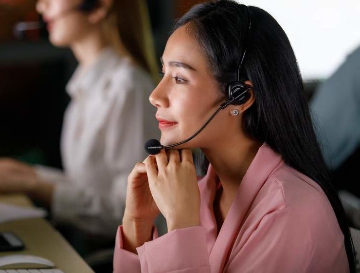 Woman wearing a call centre headset
