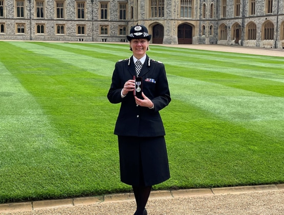 Lisa Winward receiving Queen's Award
