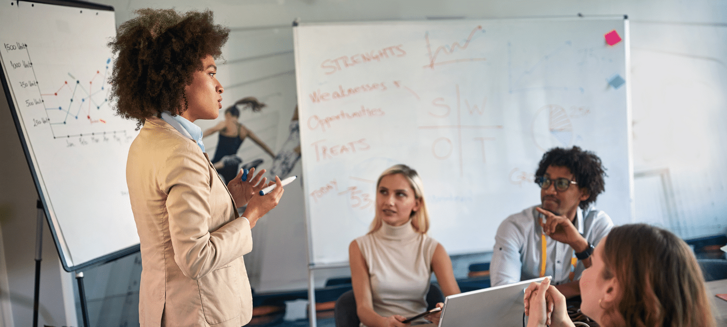 Woman leading a meeting with colleagues