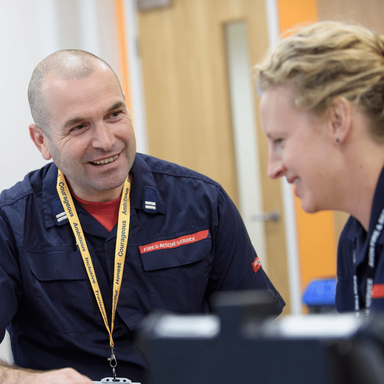 Two people working in the fire service