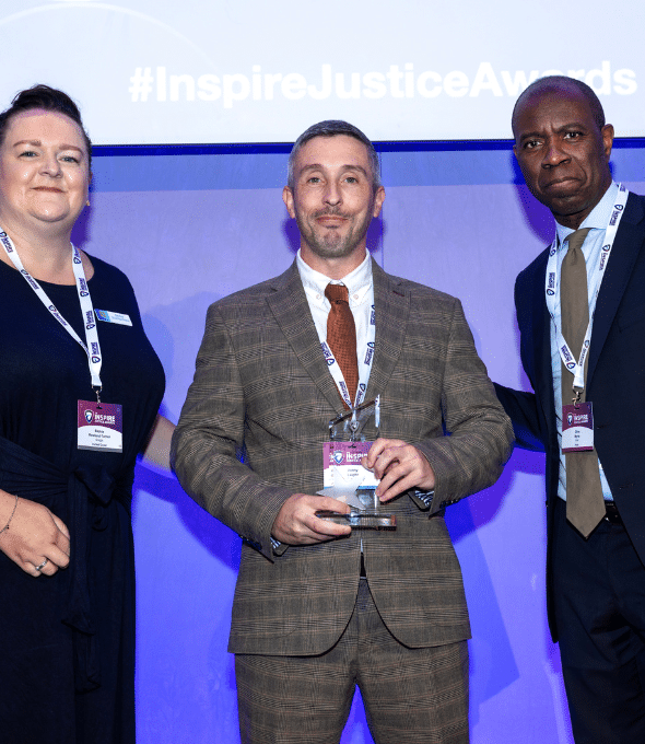 Jonny Laight receiving an Inspire Justice Award