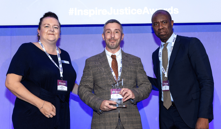 Jonny Laight receiving an Inspire Justice Award in 2024