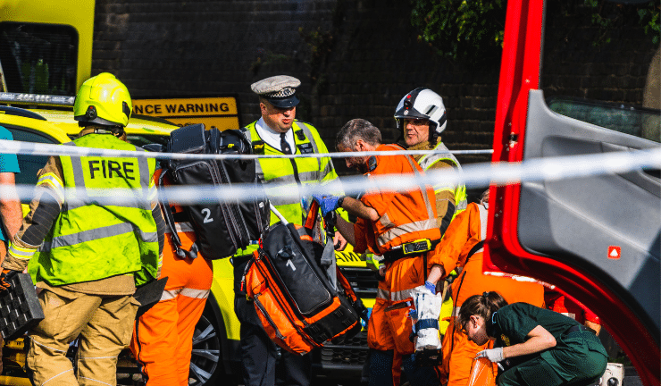 A group of emergency service workers including police and fire service personnel