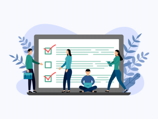 A group of people standing next to a large screen with a survey showing check marks