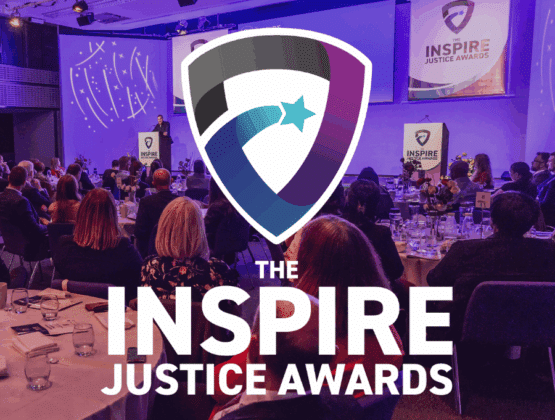 Inspire Justice Awards logo overlayed on an photo from the 2024 ceremony