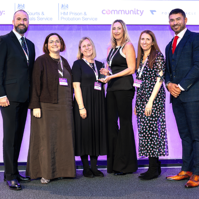 Leadership Unlocked Team, Scottish Prison Service, receiving an Inspire Justice Award