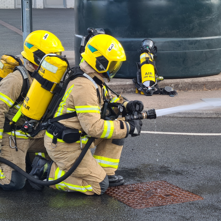 Two apprentice firefighters completing their end-point assessment
