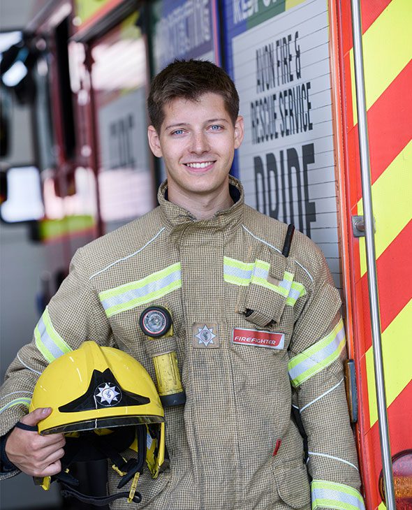 Young firefighter in uniform