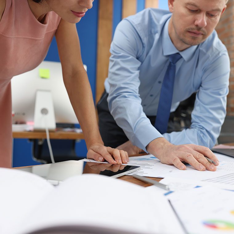 Two office colleagues working together