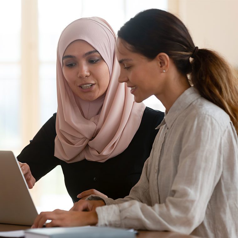 Trainer working with apprentice