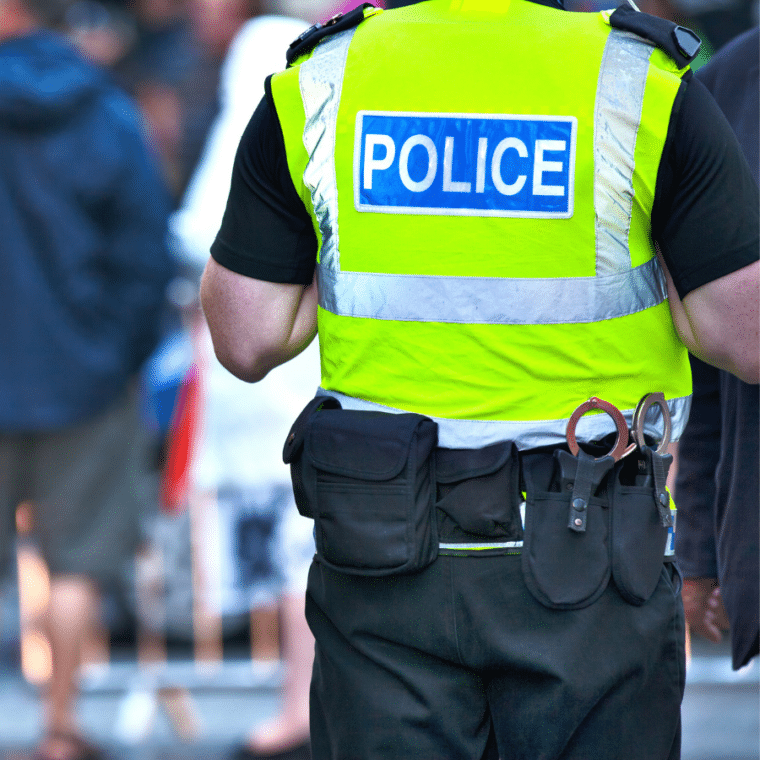 Police officer working in public.