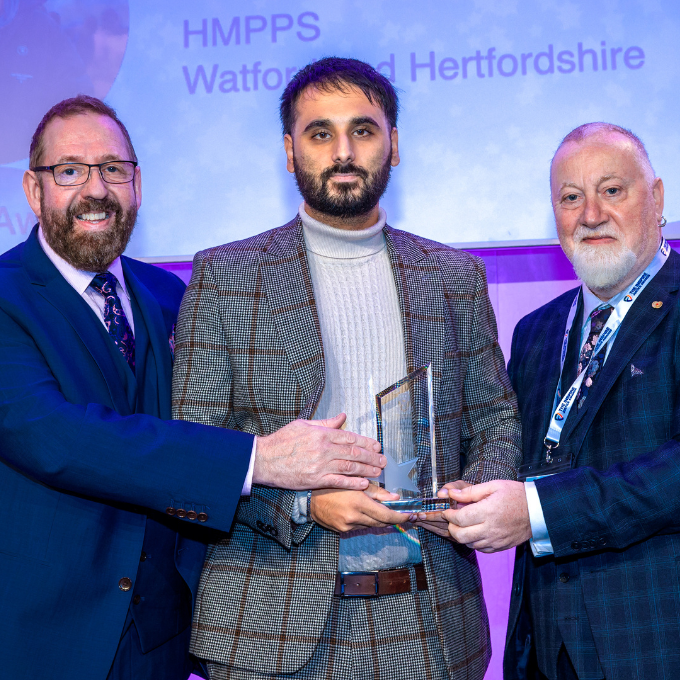 Robbie Dhesi receiving an award at the Inspire Justice Awards