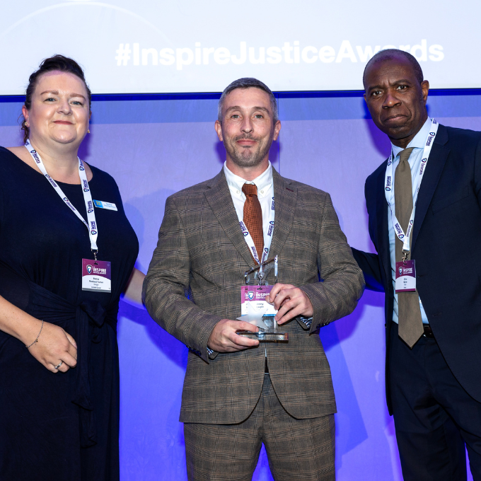 Jonny Laight receiving an Inspire Justice Award