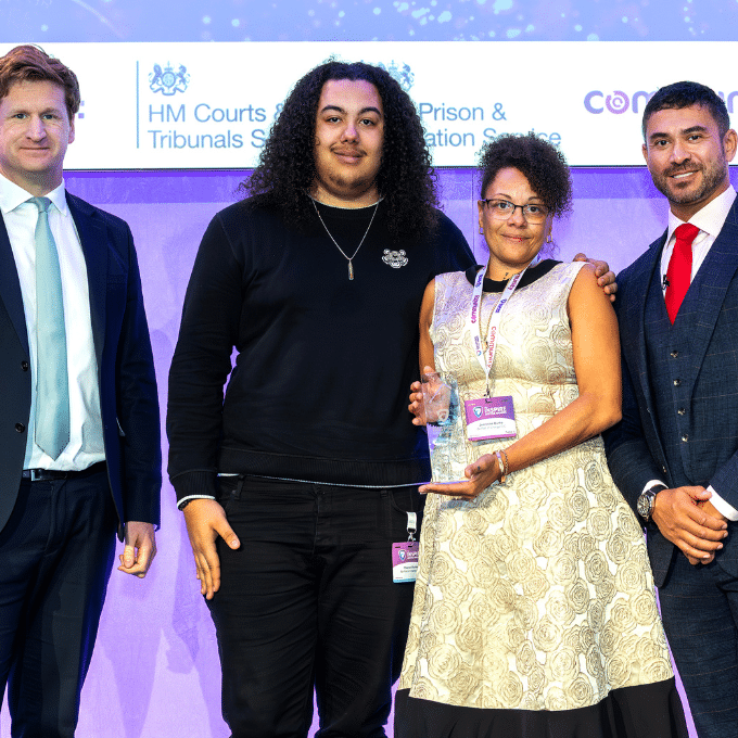 Jeanine Burke, Be Part of Change CIC receiving an Inspire Justice Award