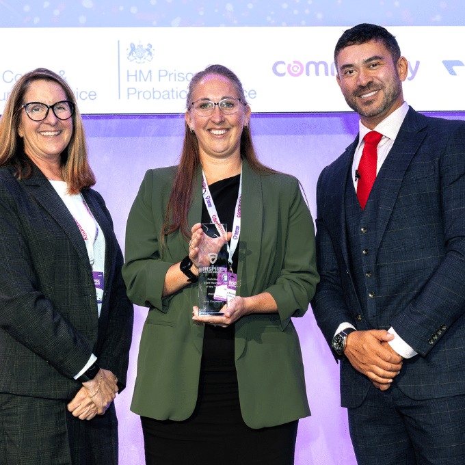 Jane Coombes receiving an Inspire Justice Award