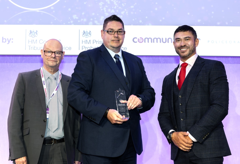 Jamie Williams receiving an Inspire Justice Award