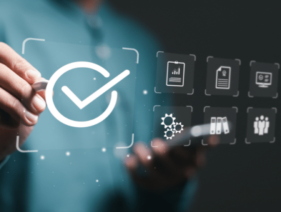 Business person use pen touching symbol of the top service Quality assurance on interface screen.